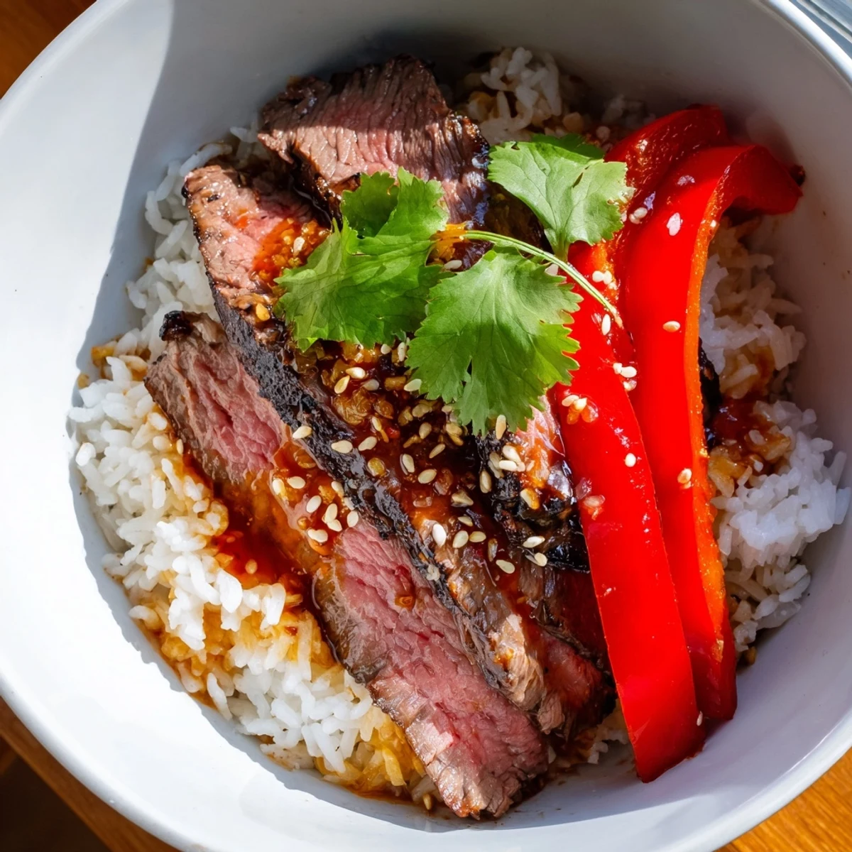 Spicy Beef Bowl with colorful bell peppers, snap peas, and carrots, perfect for spice lovers and family dinners.