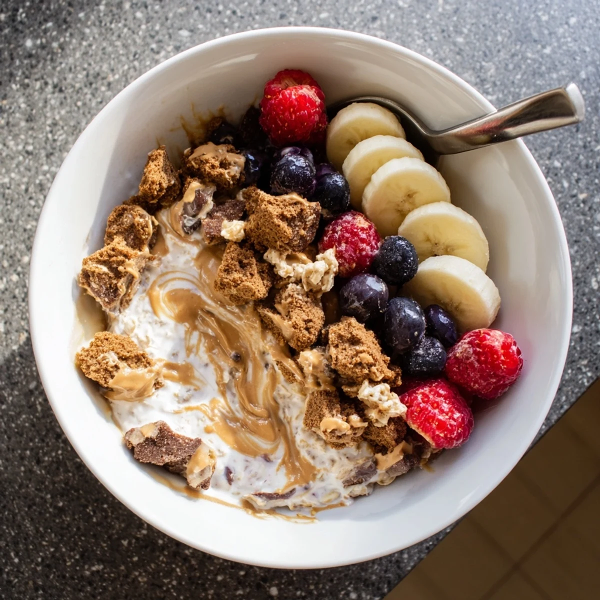 This Quick Biscoff Overnight Oats recipe features creamy oats swirled with spiced cookie butter for a quick morning treat.