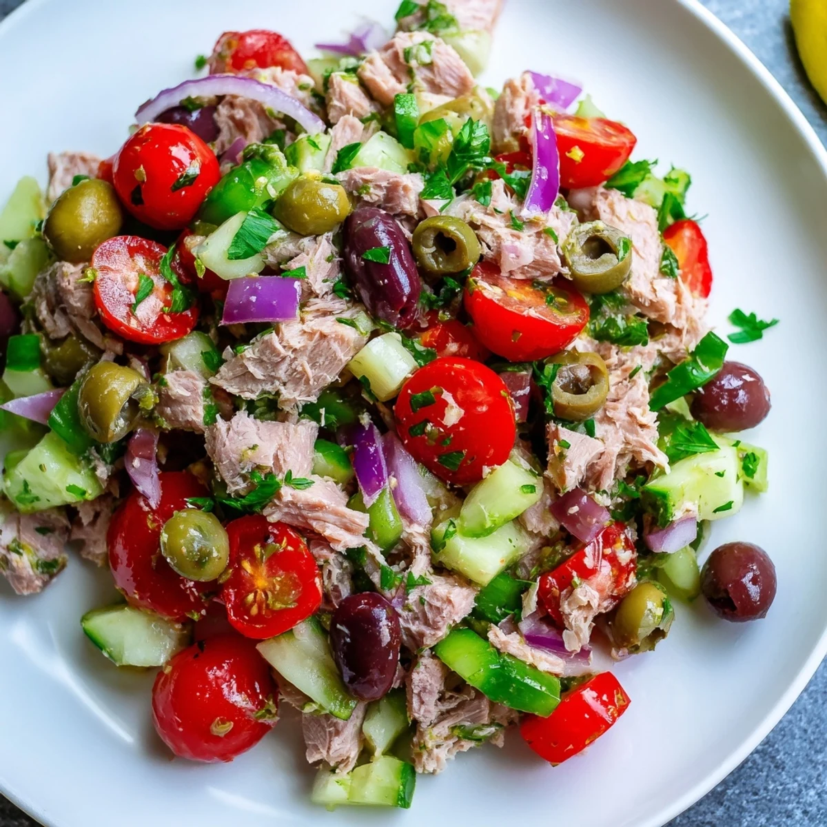 Crisp cucumber and roasted red peppers tossed through flaked tuna in zesty Mediterranean salad