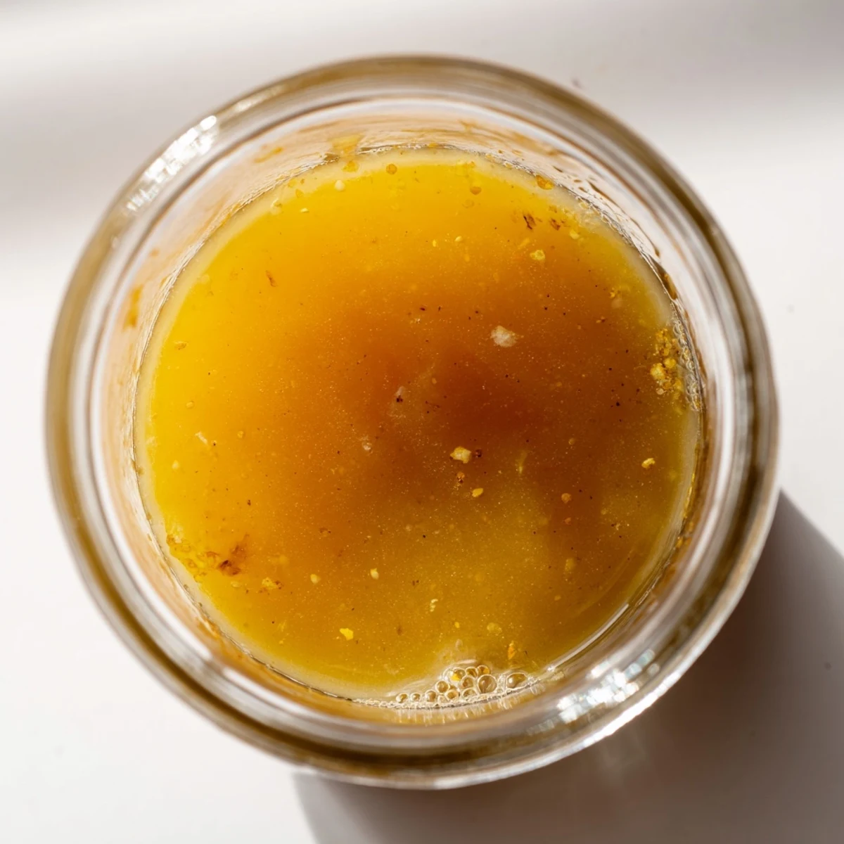 Bright citrus vinaigrette whisked to silky perfection with specks of fresh lemon zest throughout