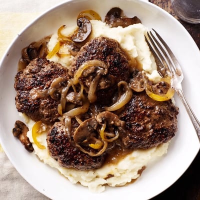Slow simmered Country Style Smothered Cube Steak Recipe with golden seared edges, savory gravy